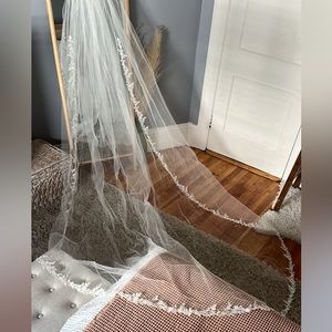 Cathedral tulle veil with embroidered floral outline